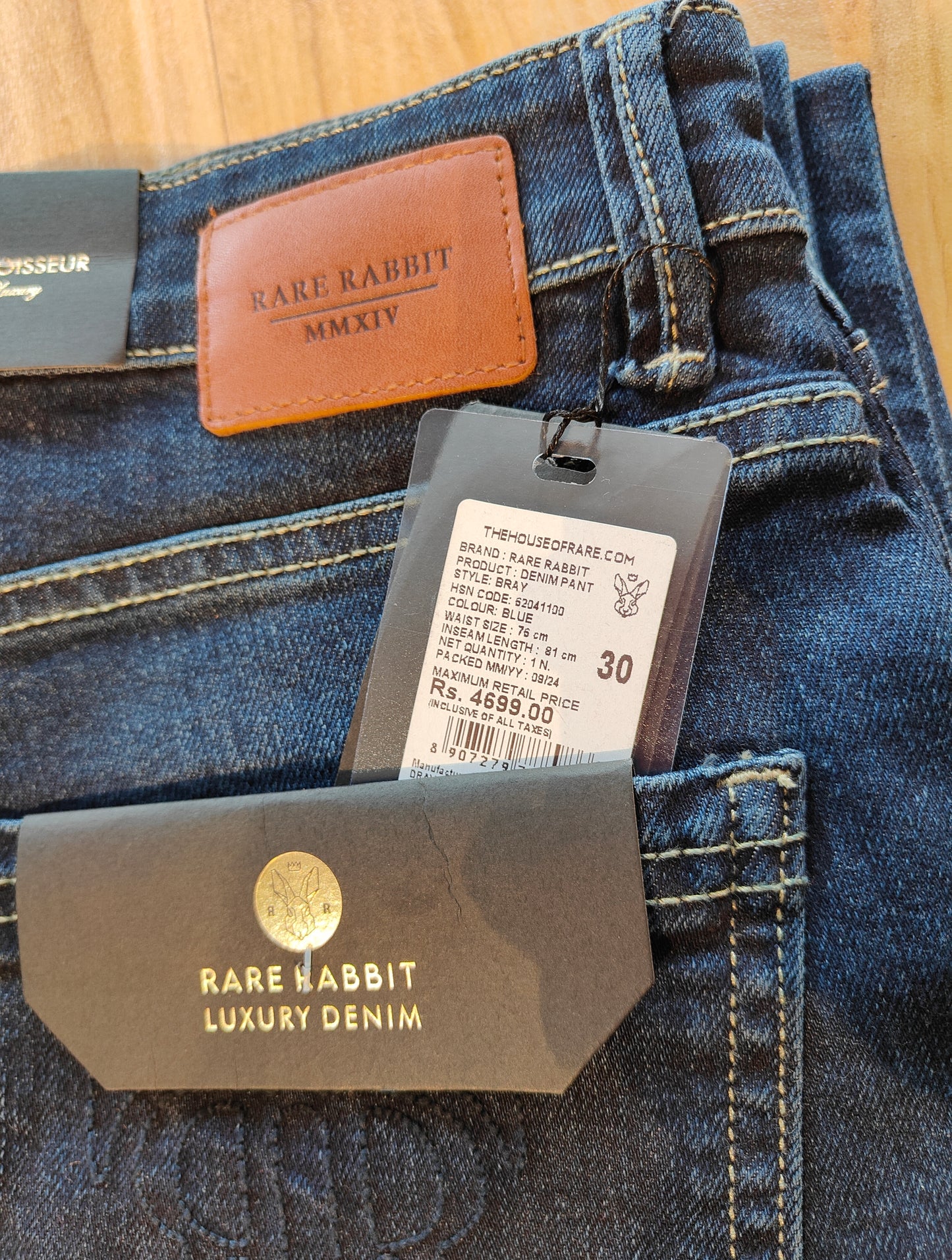 Rare Rabbit Men’s Mid-Wash Denim Jeans (Blue)