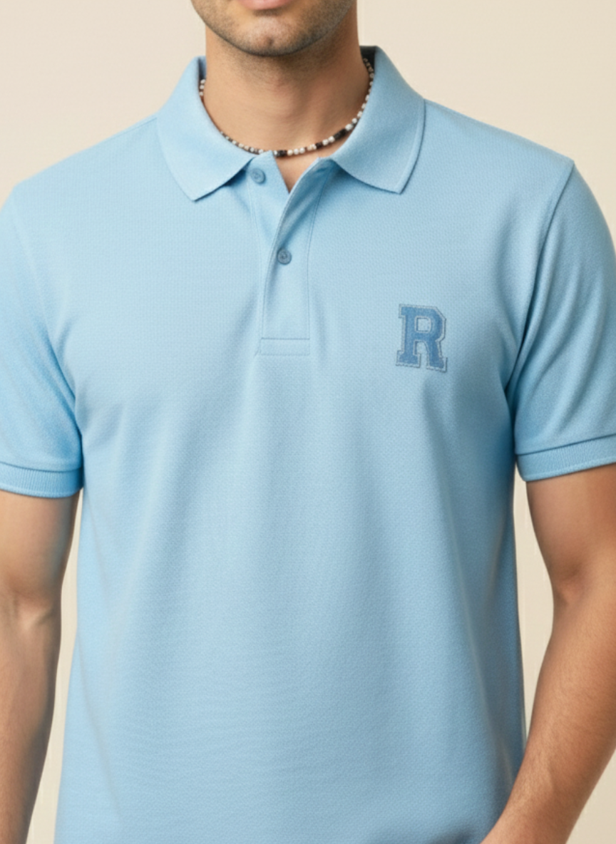 Rare Rabbit Men’s Solid Polo T-Shirt – Sky Blue | Premium Cotton Piqué