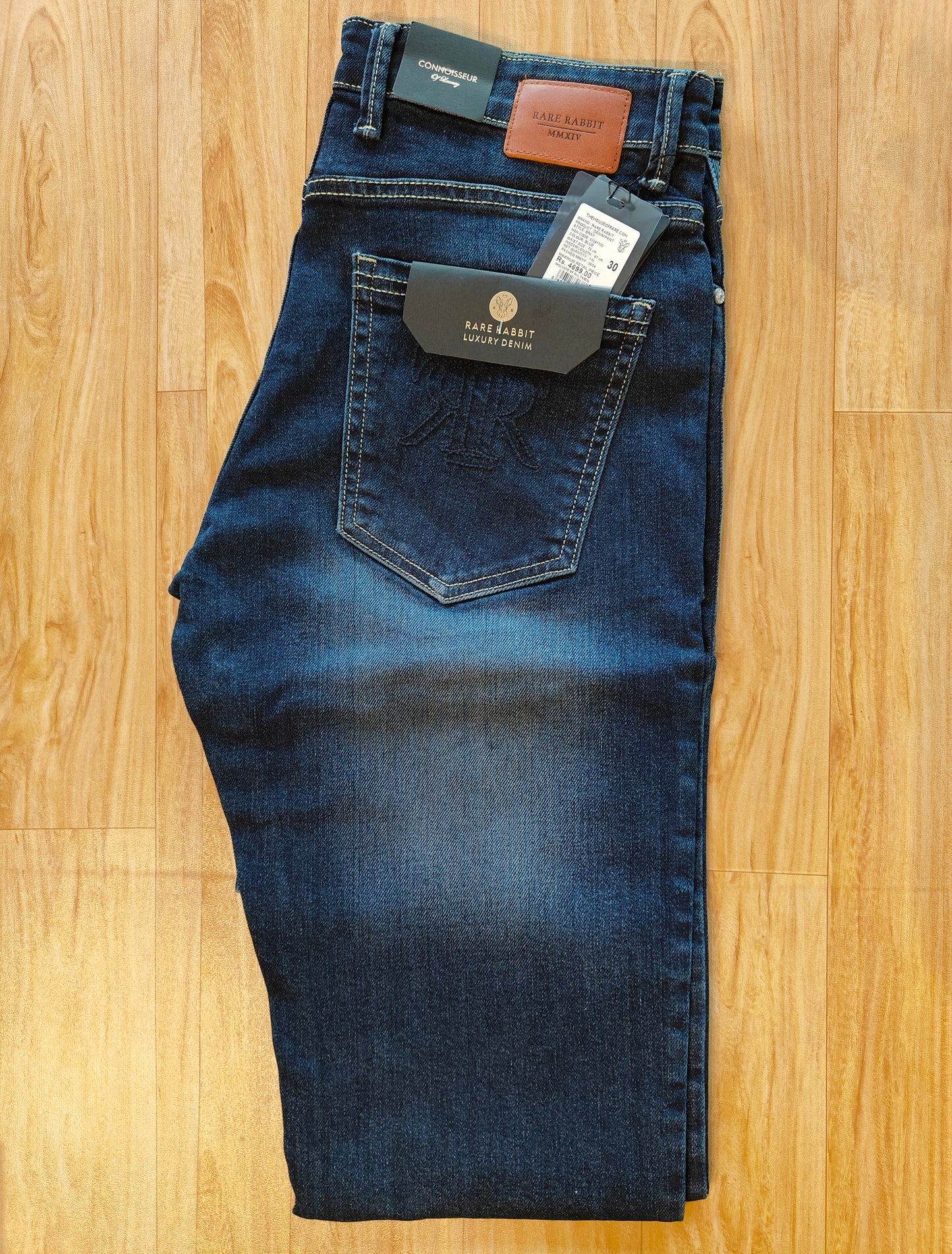 Rare Rabbit Men’s Mid-Wash Denim Jeans (Blue)