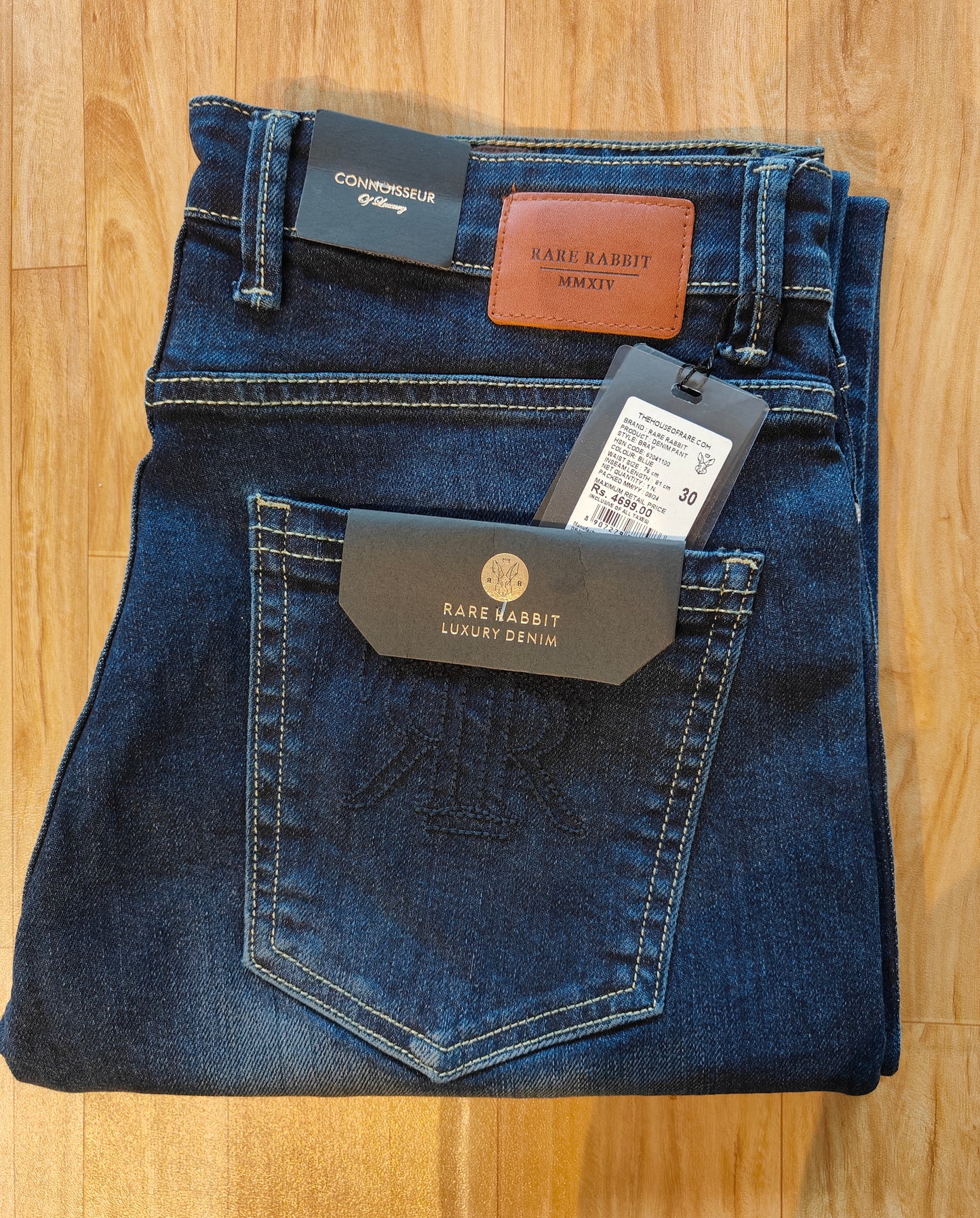 Rare Rabbit Men’s Mid-Wash Denim Jeans (Blue)