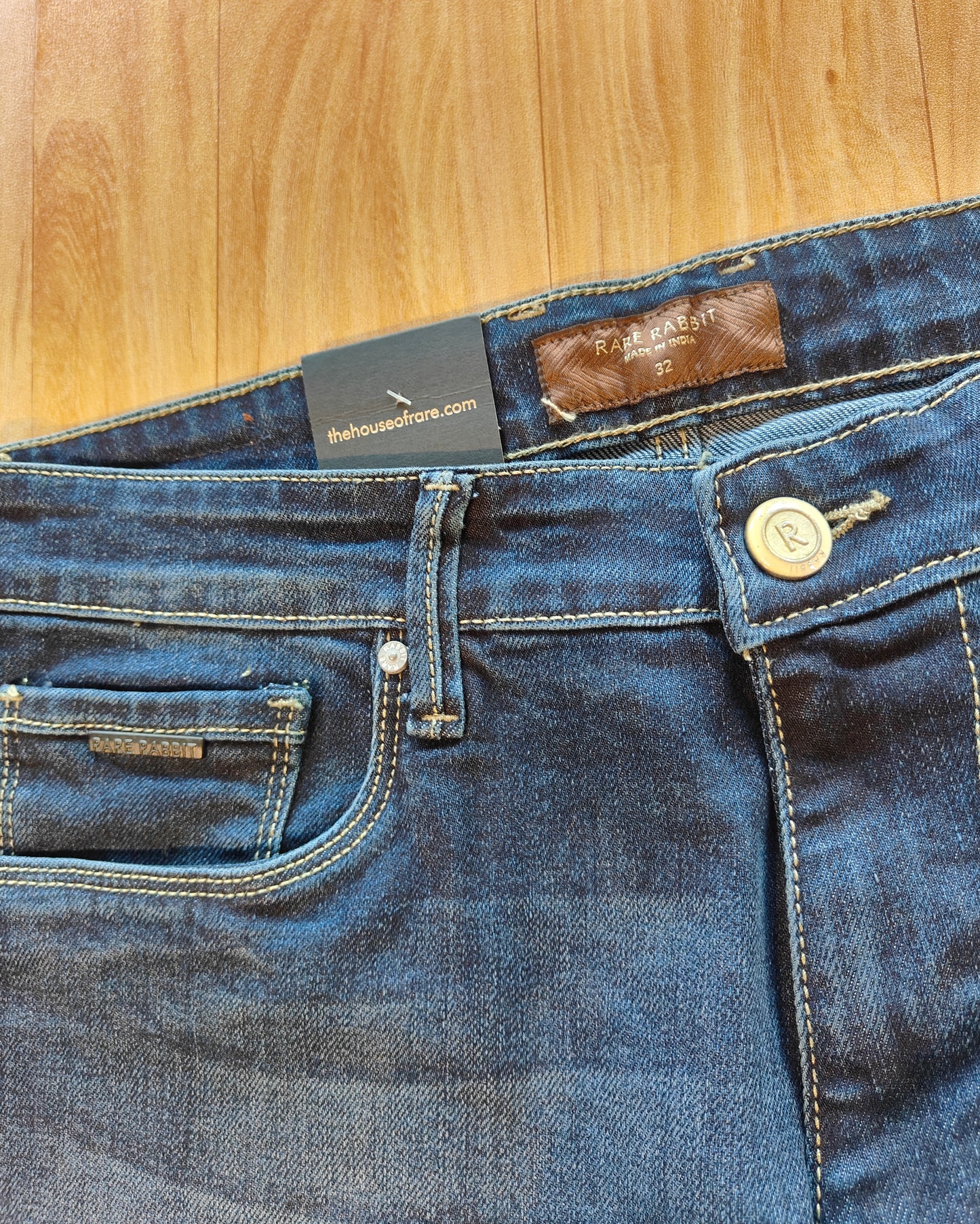Rare Rabbit Men’s Mid-Wash Denim Jeans (Blue)